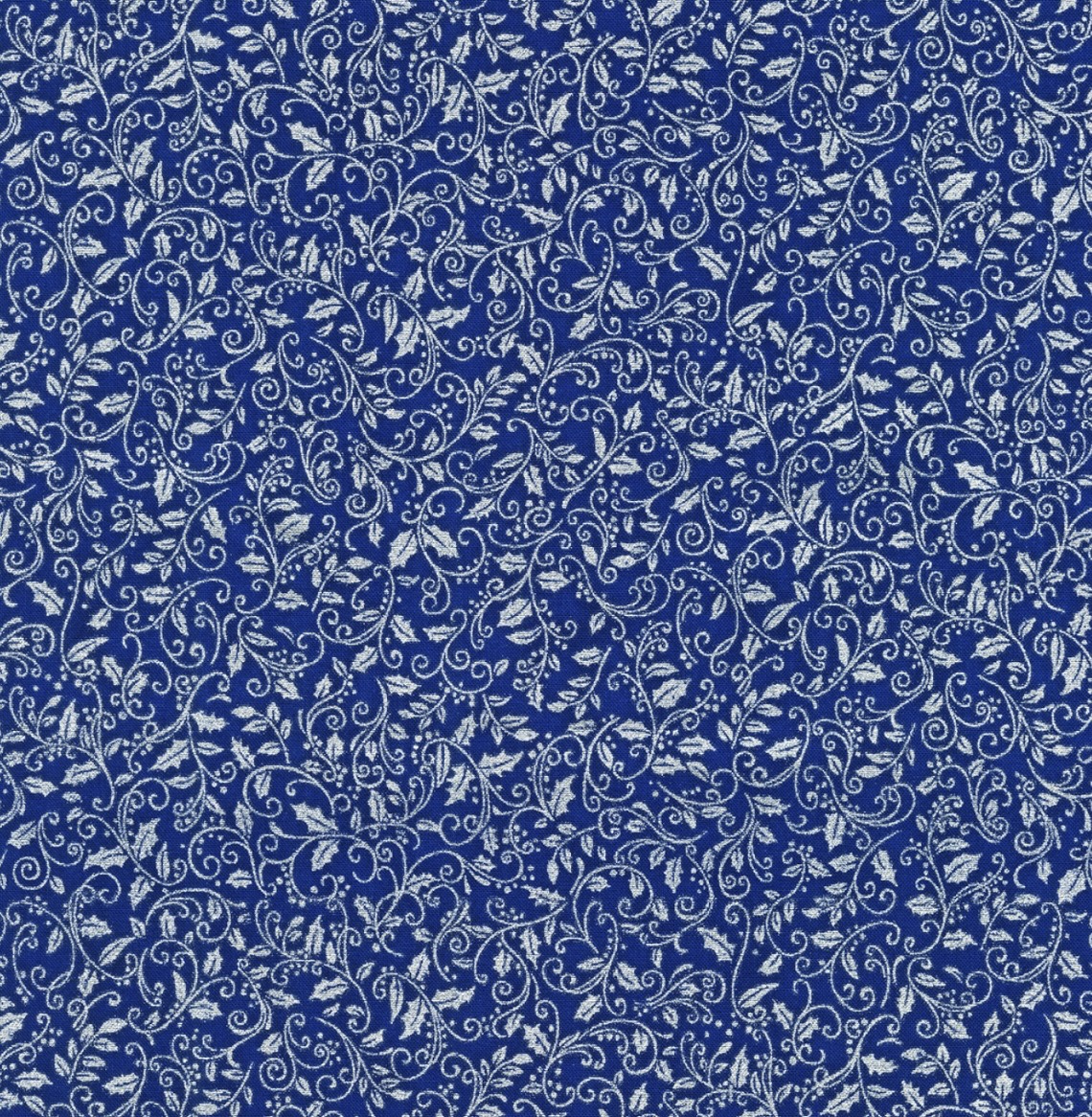 Weihnachtstoff in Blau mit silbernen Blätterranken
