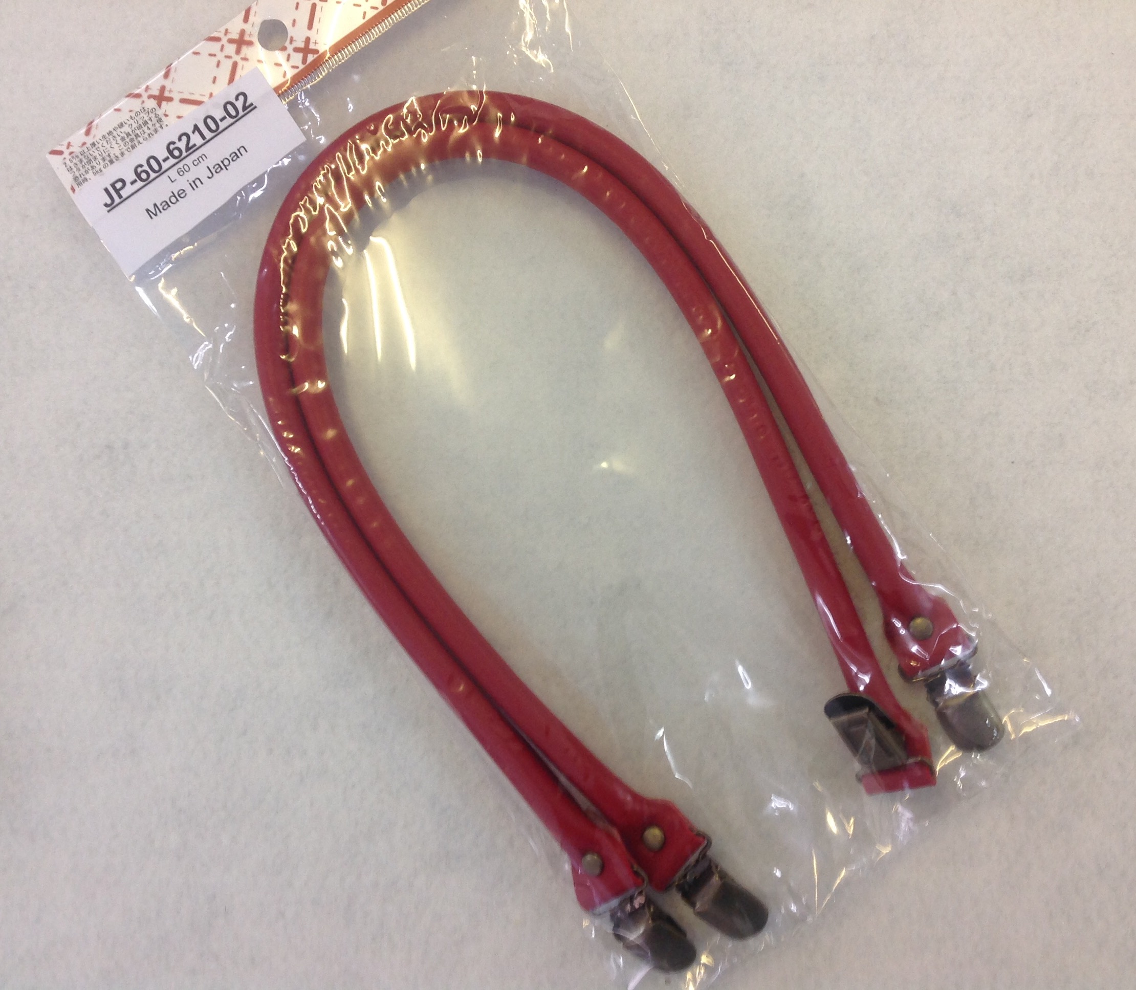 Taschengriffe in Rot mit Clips in Silber/ Leder