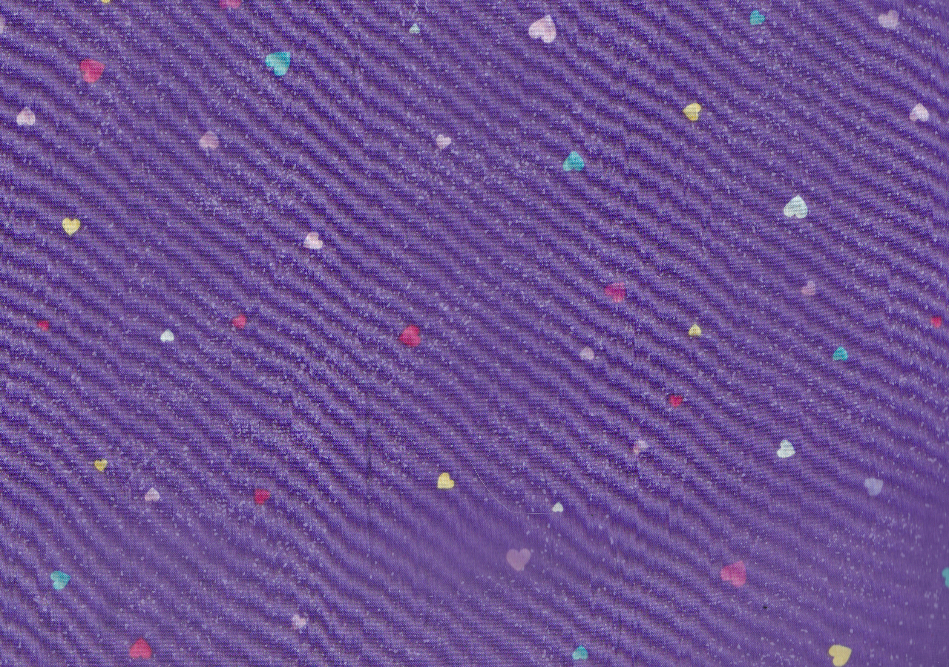 Stoff in Lila mit Herzchen Muster