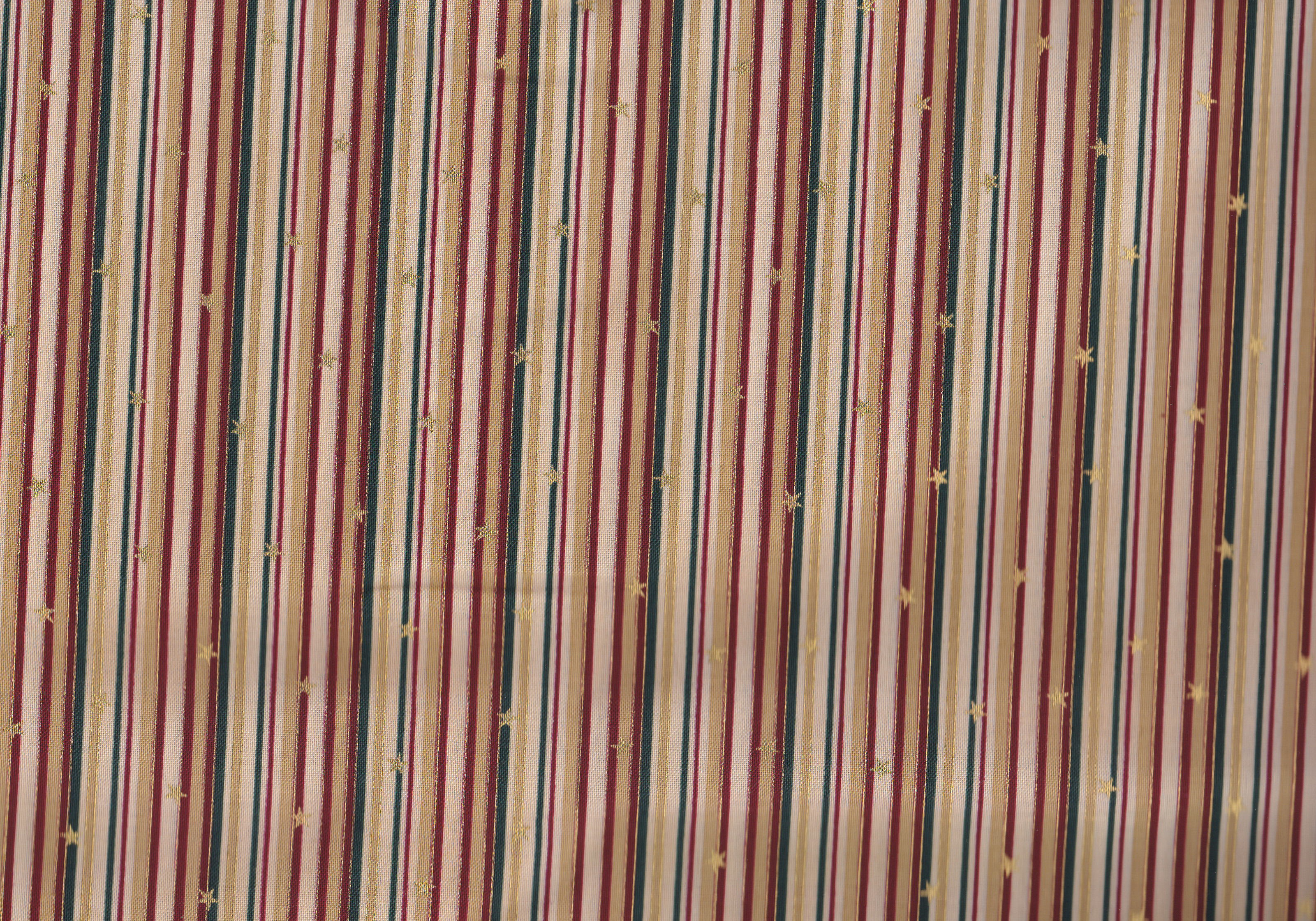 Christmas Wonder Beige mit Sternen und Streifen.