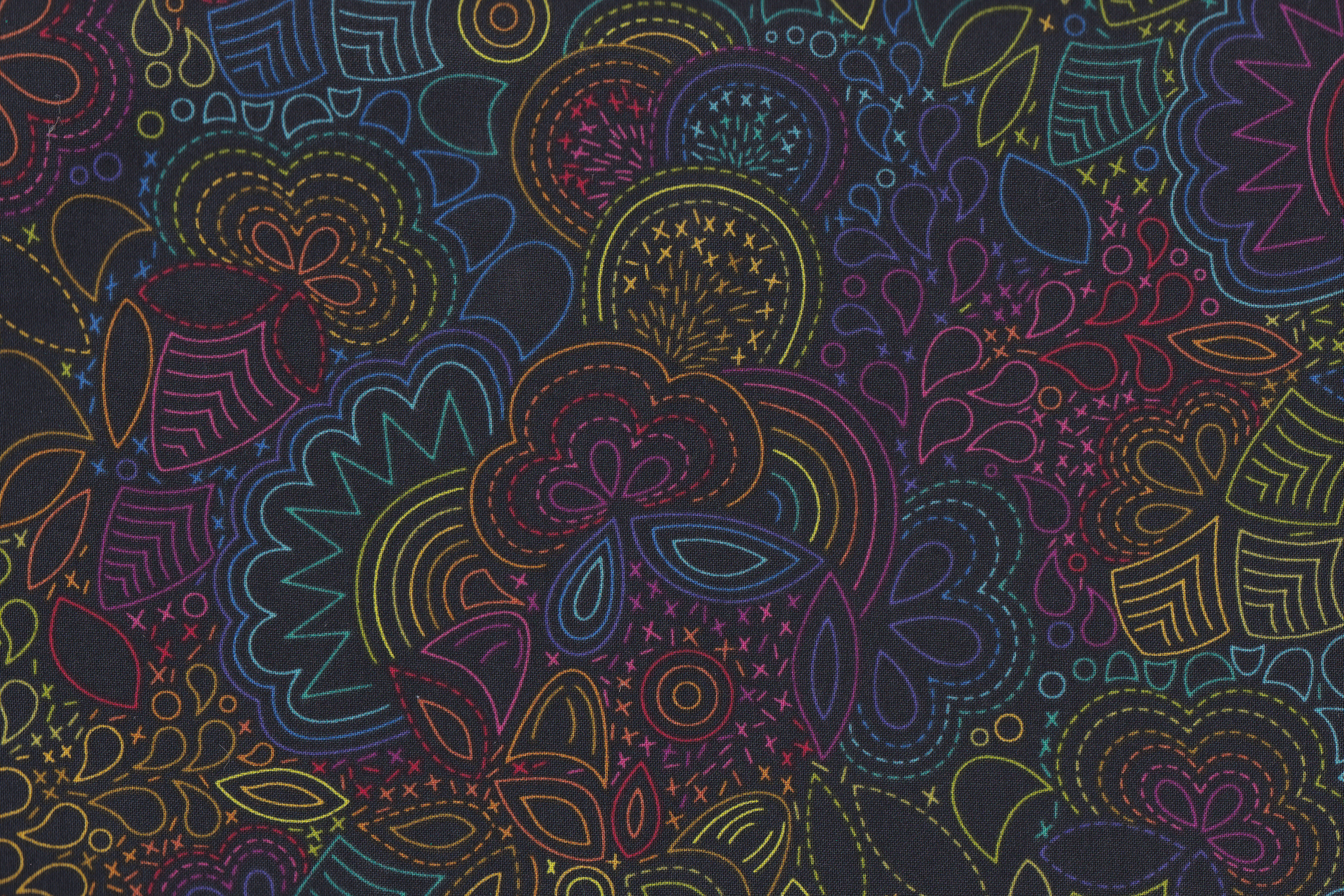 Stoff mit bunten Stickmuster