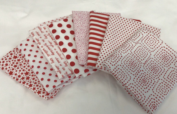 Stoffe in Weiß mit kleinen Muster in Rot